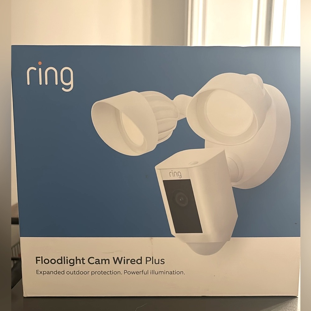 Ring Floodlight Cam Wired Plus. Brand new never used. Original price $199.00